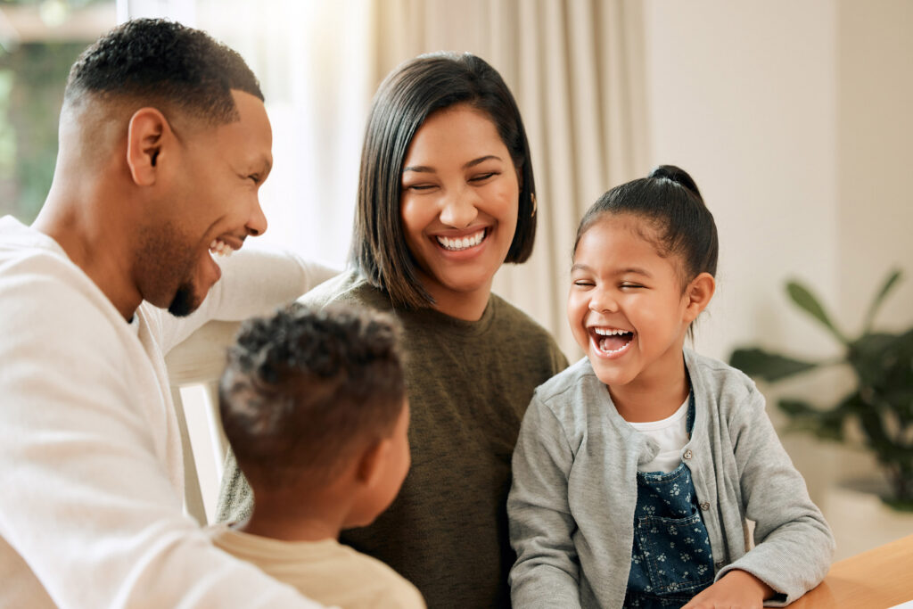 Young family together at home.